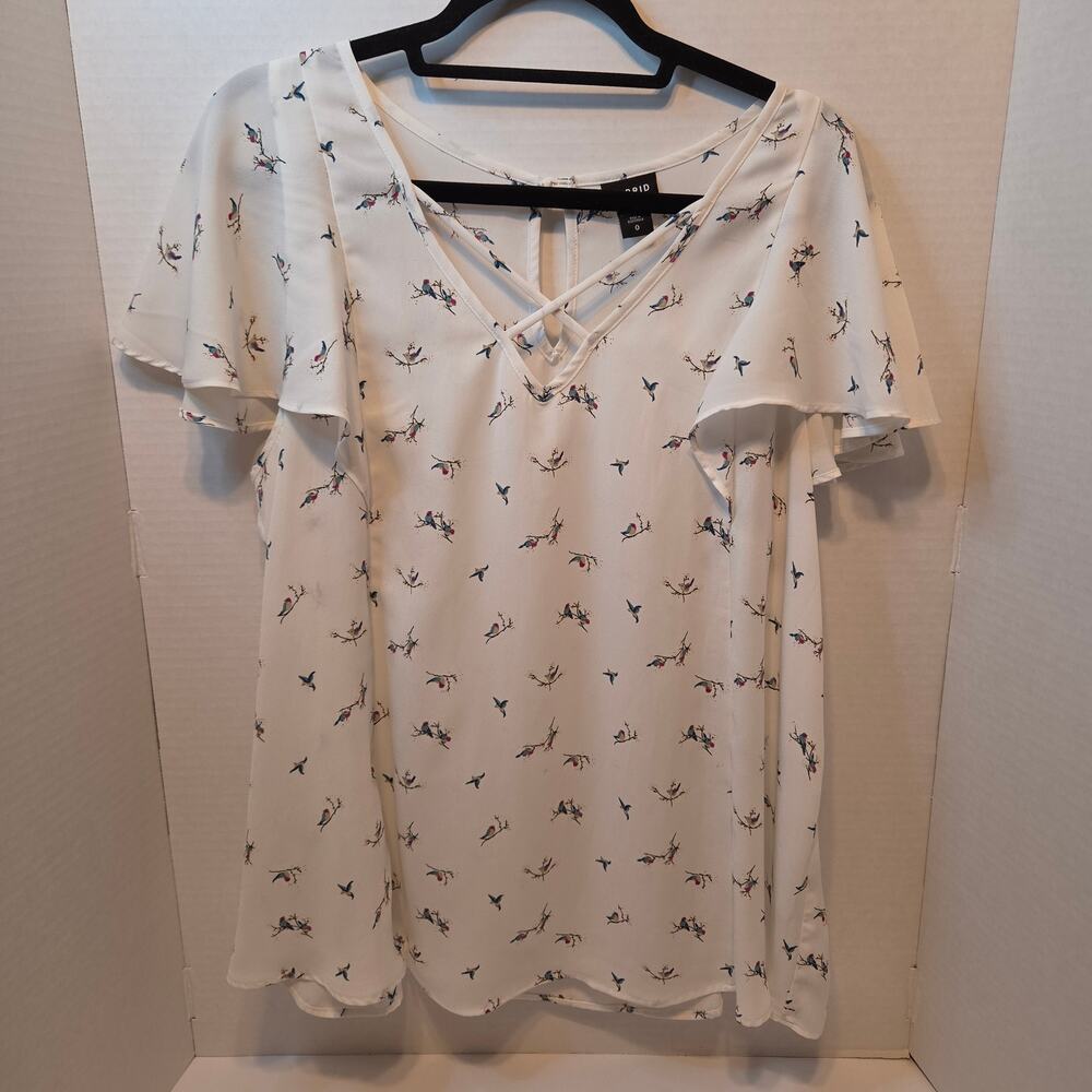 Torrid White Blouse colorful print crisscross V-neck ruffle cap sleeves Torrid 0